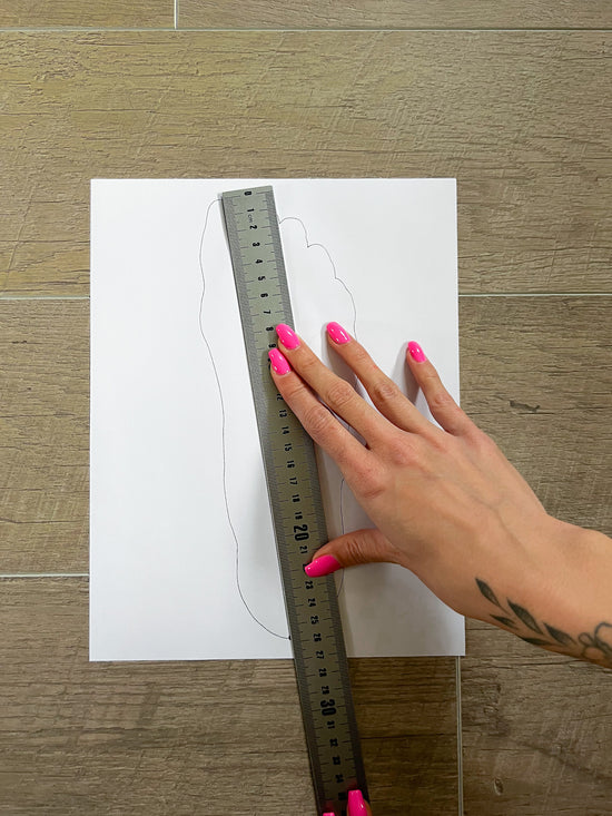 measuring foot length from the heel to the tip of your big (or longest) toe